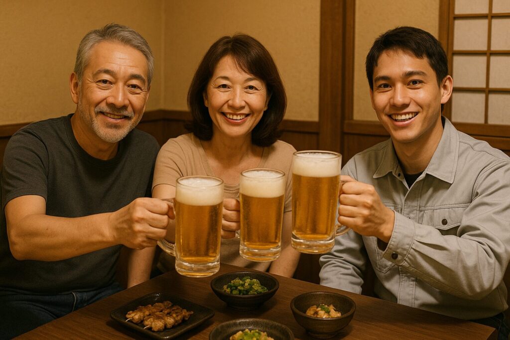 施工後のお客様と乾杯するオフ会の写真。笑顔でビールを持つ3名。